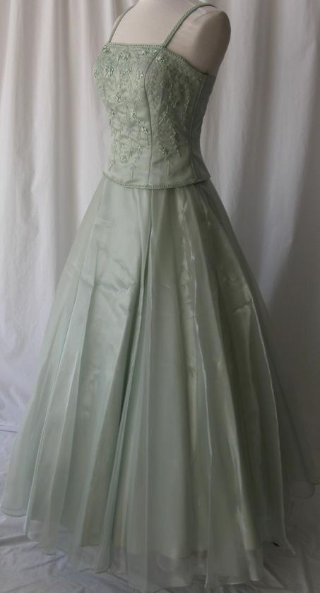   ball gown dress the color is sage the dress is made from satin bodice