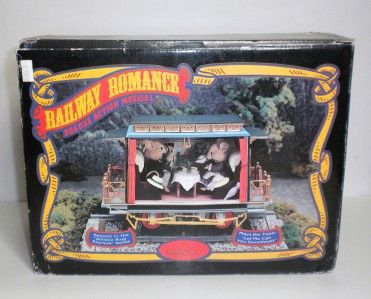 EM06  ENESCO RAILWAY ROMAMCE DELUXE ACTION MUSICAL  