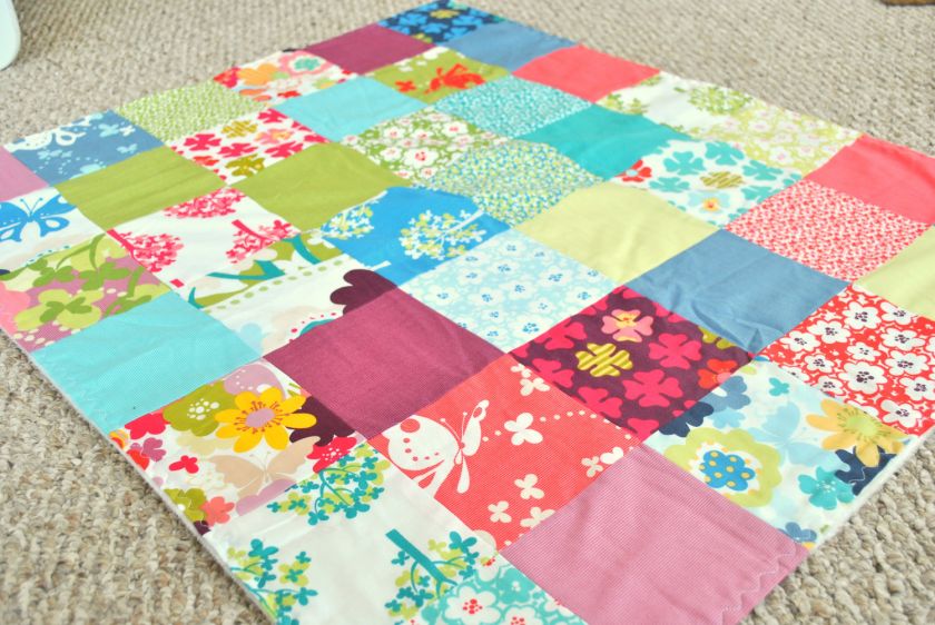  this is a designer handmade patchwork baby blanket 