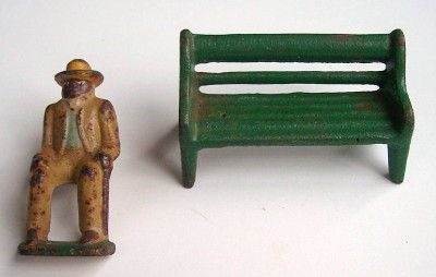 Antique Cast Iron Toy GREY IRON OLD COLORED MAN & BENCH  