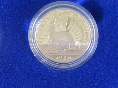 1986 S Silver Liberty Dollar and Liberty Half Dollar Commemorative 