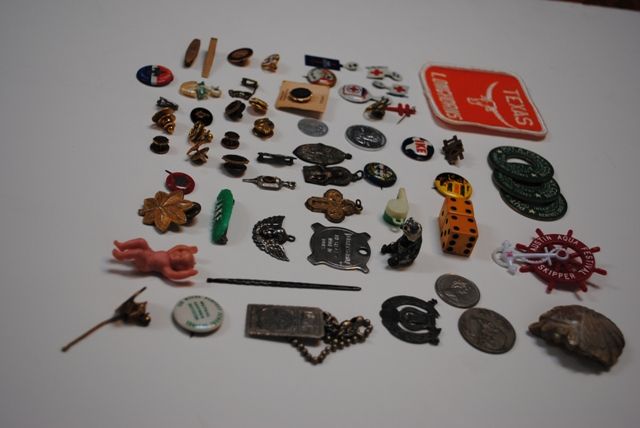   dress clips, a Jake Pickle pin, Ike pins, Red Cross, Boy Scouts