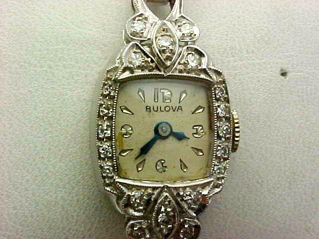 PLATINUM VINTAGE BULOVA DIAMOND LADIES WATCH  