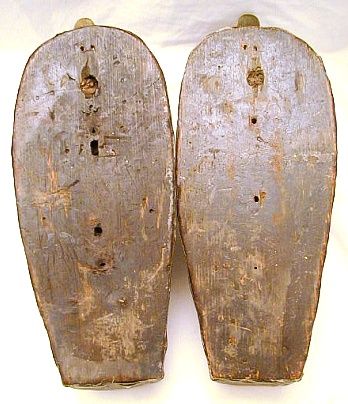 Pair of vintage carved wood, canvas and cork duck decoys. Circa 1920s 