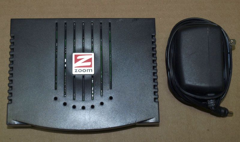 ZOOM 56K EXTERNAL FAX MODEM PN 3049C  